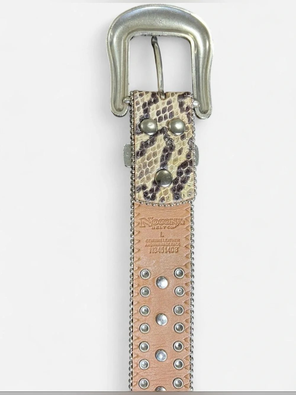 Nocona Women’s Western style rinestone studded genuine leather belt.
